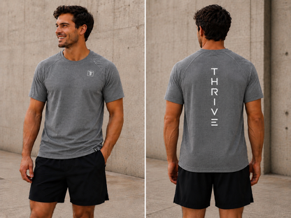 Thrive Elite Athletic T Shirt front view in heather gray with small chest logo on Tampa Home & Garden Store
Thrive Elite Athletic T Shirt back view in heather gray with vertical THRIVE branding down back on Tampa Home & Garden Store