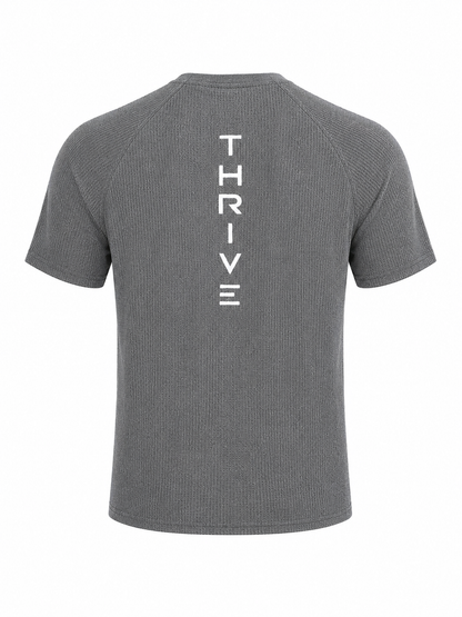 Thrive Elite Athletic T Shirt back view in gray knit with vertical Thrive logo on Tampa Home & Garden Store