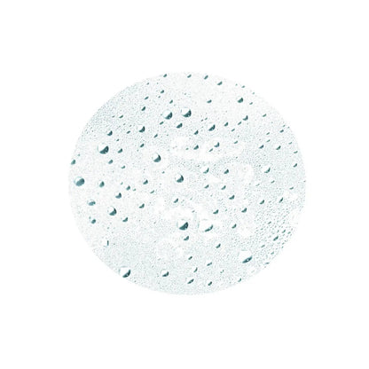 Leonor Greyl TONIQUE VÉGÉTAL hair styling product close-up with a circle of water droplets on Tampa Home & Garden Store