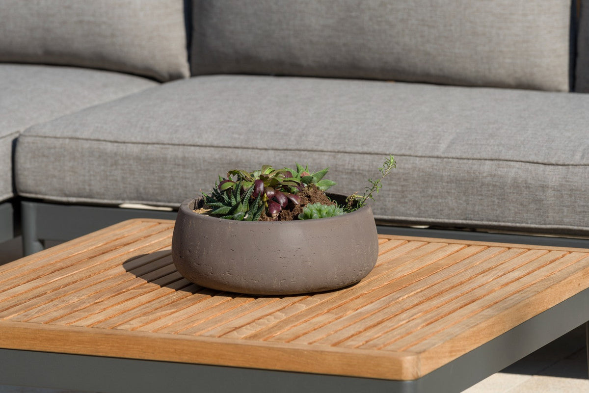 Topaz Square Coffee Table with light wood slat top and gray metal frame; round clay planter with succulents on Tampa Home & Garden Store