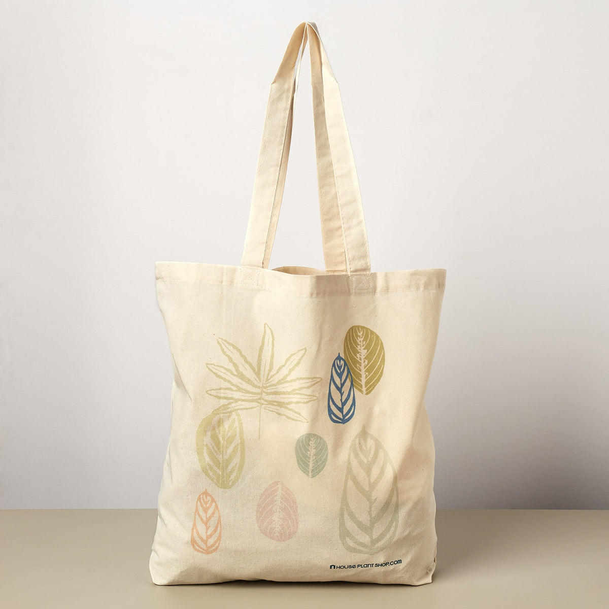 Pastel Leaves Tote Bag natural canvas with pastel leaf prints and handles by House Plant Shop on Tampa Home & Garden Store
