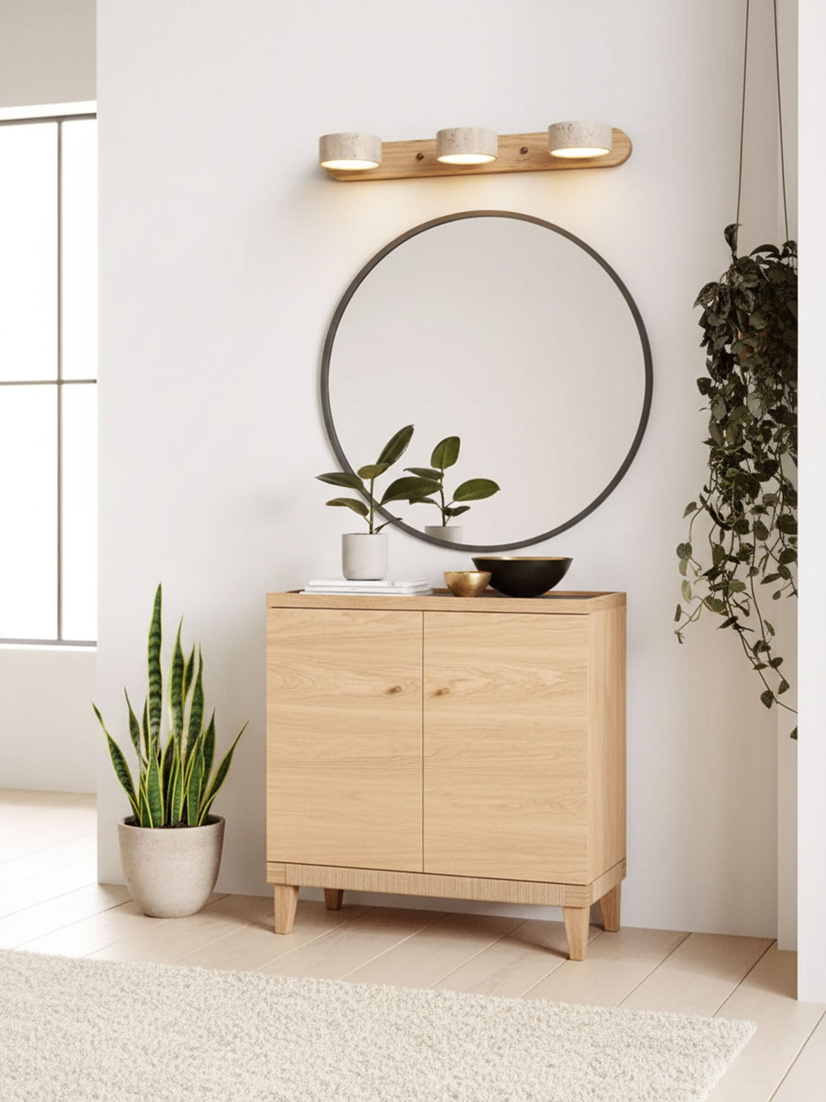Travertine stone wall sconce with dimmable LED and natural wood accent above a mirror on Tampa Home & Garden Store