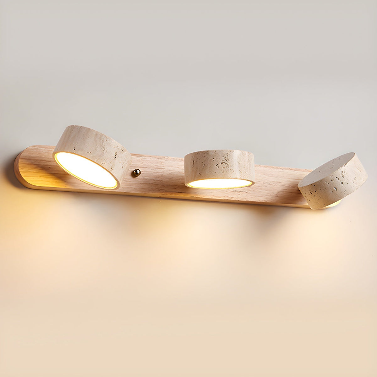 Travertine stone wall sconce with dimmable LED, natural wood base, Moktan Sabai light on Tampa Home & Garden Store