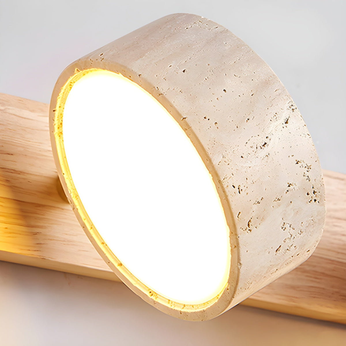 Travertine stone round wall sconce with dimmable LED and natural wood accent on Tampa Home & Garden Store