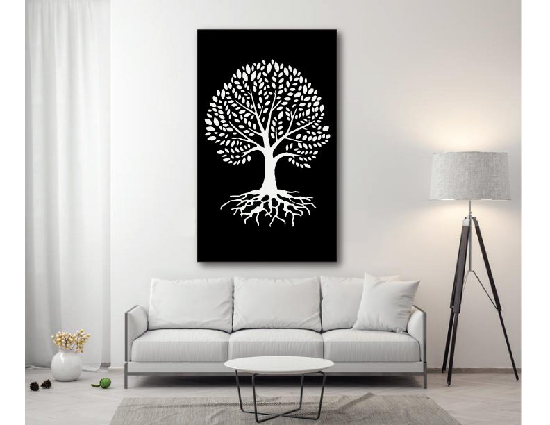 Metal Tree of Life wall art with white silhouette on black panel above a white sofa on Tampa Home & Garden Store