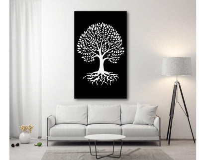 Metal Tree of Life wall art with white silhouette on black panel above a white sofa on Tampa Home & Garden Store