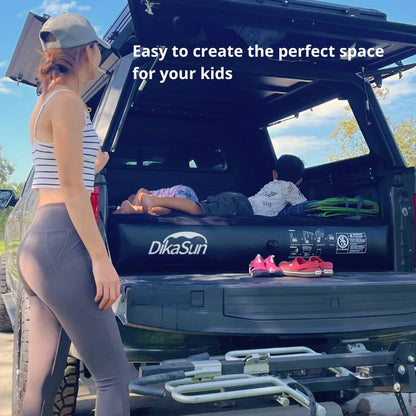 DikaSun truck bed air mattress, black, 5.5–5.8 ft, in pickup bed with kids relaxing on it on Tampa Home & Garden Store
