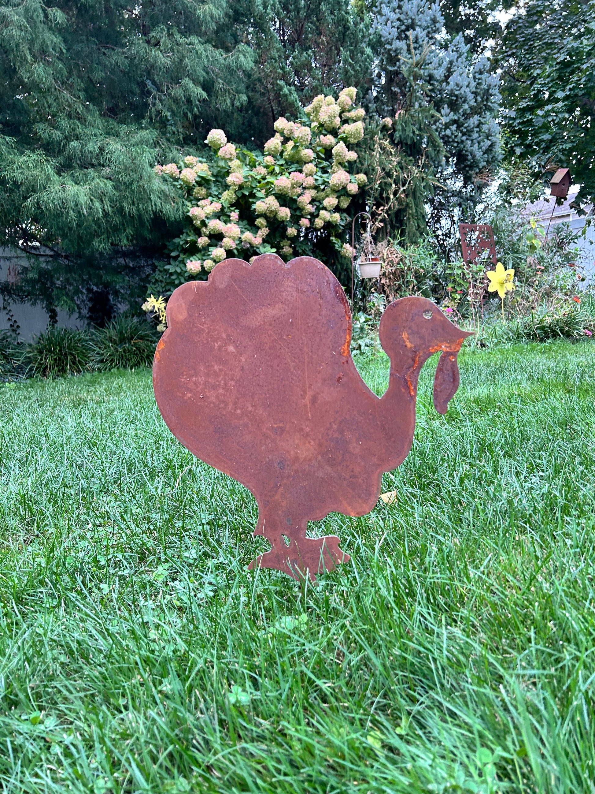 Turkey Decoration with two rusted metal turkeys for outdoor Thanksgiving decor in sizes on Tampa Home & Garden Store