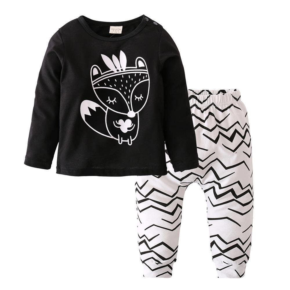 Newborn Stevvex boy 2-piece set: black long-sleeve tee with white graphic and chevron pants on Tampa Home & Garden Store
