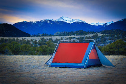 Sky View XL Tent red and blue, set against mountain backdrop on Tampa Home & Garden Store