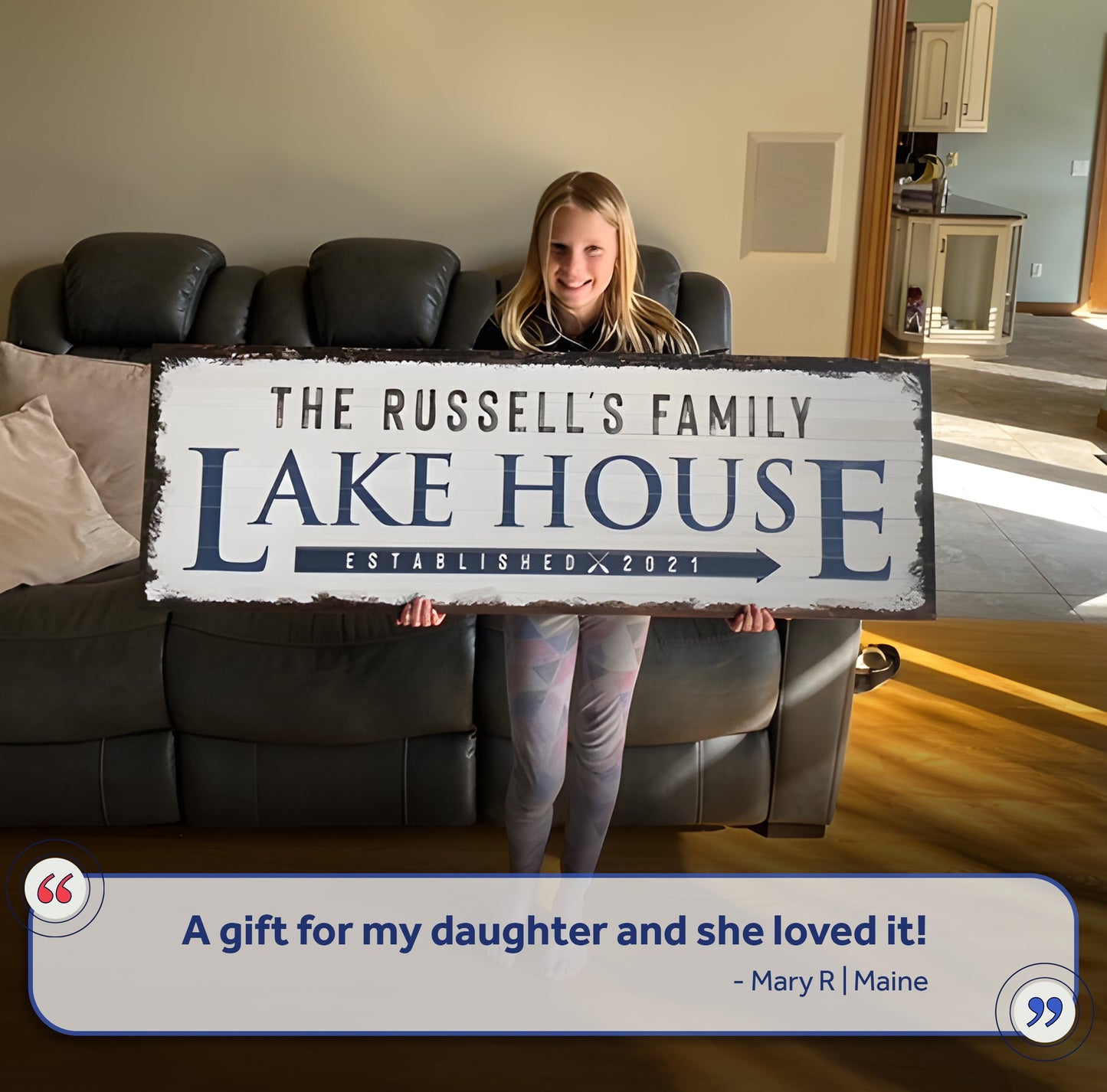 Family Lake House Arrow Sign canvas by Tailored Canvases, navy text on white, held by a girl on Tampa Home & Garden Store