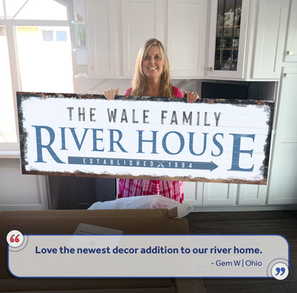 Canvas sign Family River House Arrow Sign by Tailored Canvases, blue lettering on Tampa Home & Garden Store