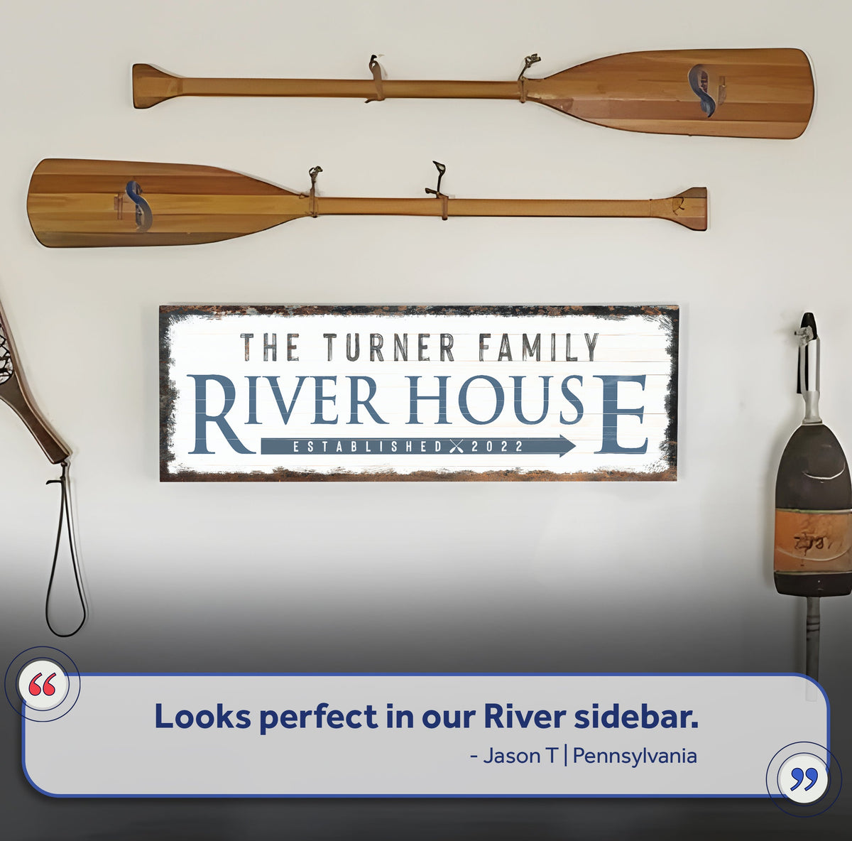 Family River House Arrow Sign Canvas sign with blue text beside paddles in Tampa Home & Garden on Tampa Home & Garden Store