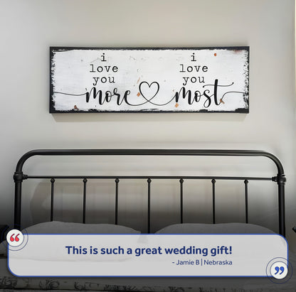 Canvas sign I Love You More I Love You Most with distressed white backdrop and heart motif on Tampa Home & Garden Store