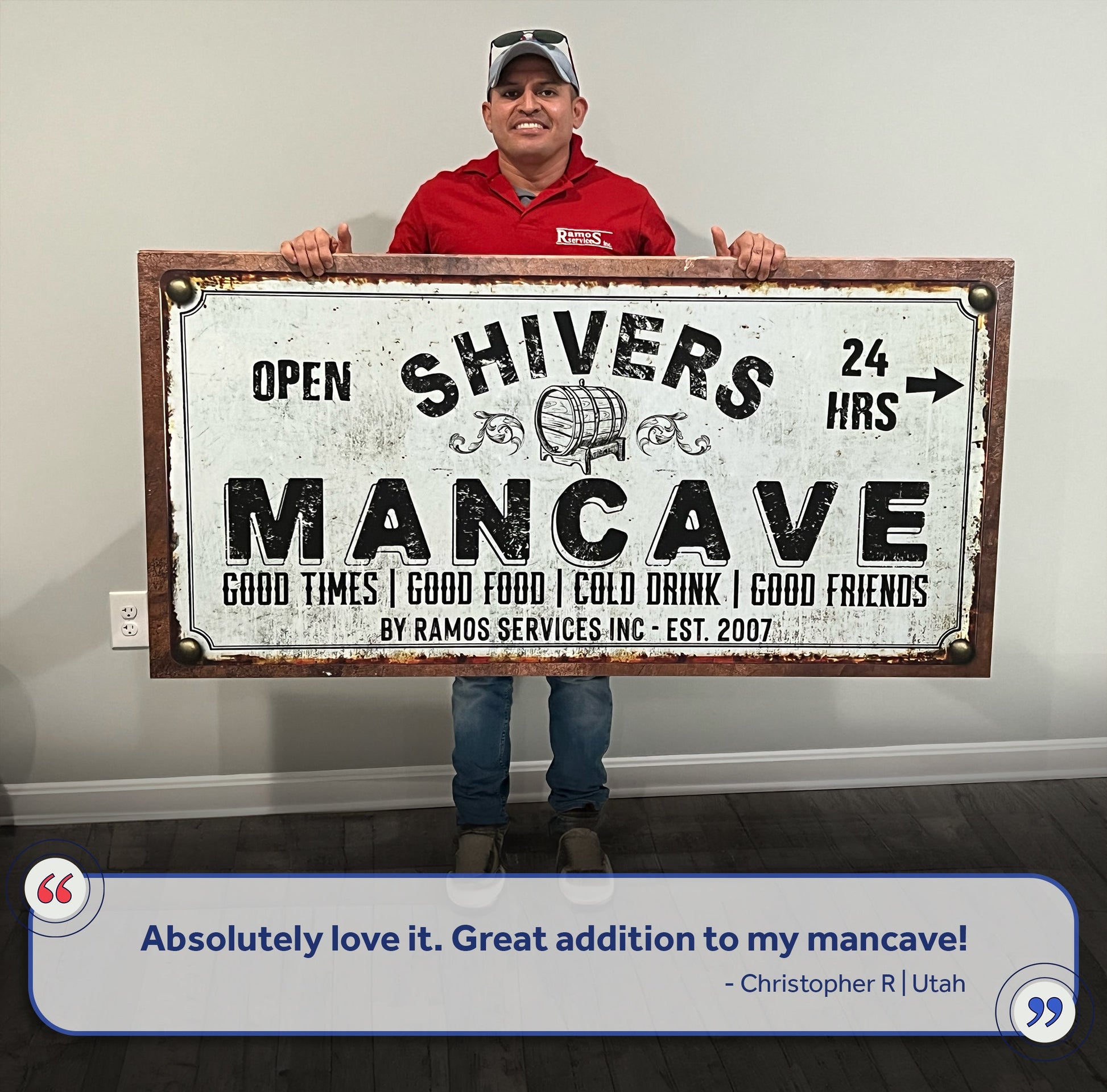 Man Cave Sign canvas by Tailored Canvases, rusted frame, distressed print held by a man in a red shirt on Tampa Home & Garden Store