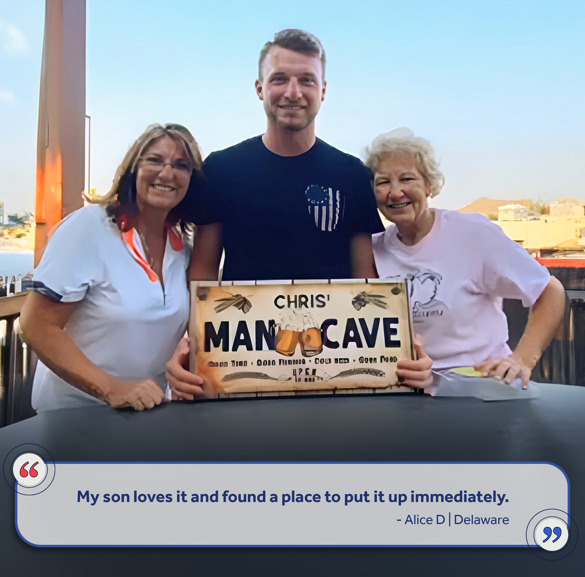 Man Cave Sign IV canvas by Tailored Canvases; wood plaque CHRIS' MAN CAVE held by three smiling adults on Tampa Home & Garden Store