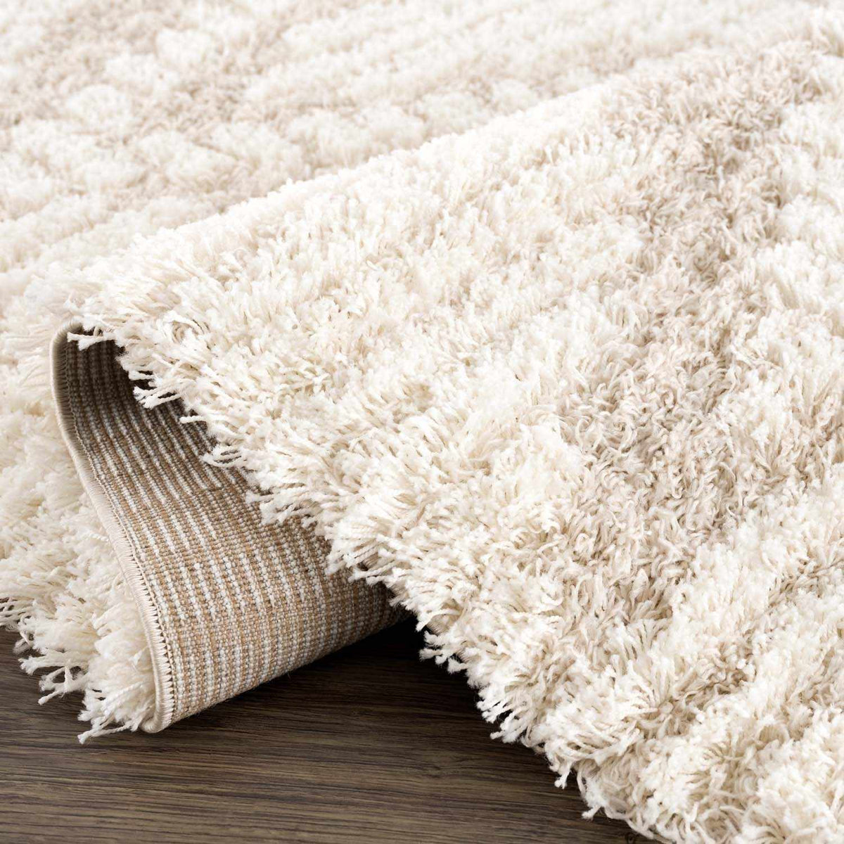 Igor Shag Area Rug cream beige shag pile by Boutique Rugs with rolled edge underside on Tampa Home & Garden Store