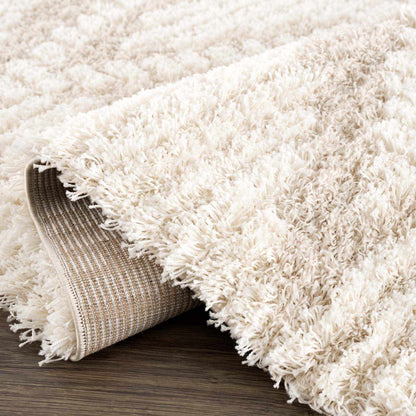 Igor Shag Area Rug cream beige shag pile by Boutique Rugs with rolled edge underside on Tampa Home & Garden Store