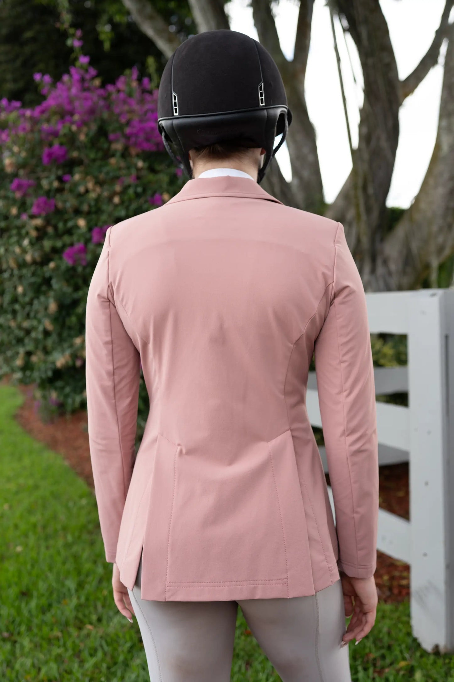 Grand Prix Quinn Rose Show Jacket Huntley Equestrian pink back view on rider on Tampa Home & Garden Store