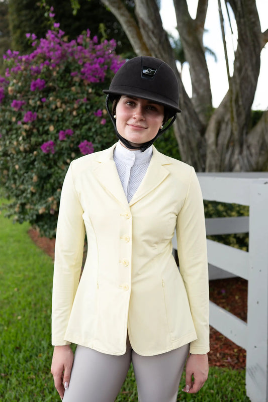 Grand Prix Quinn Show Jacket butter yellow, 4-button front with hidden zipper worn by rider on Tampa Home & Garden Store