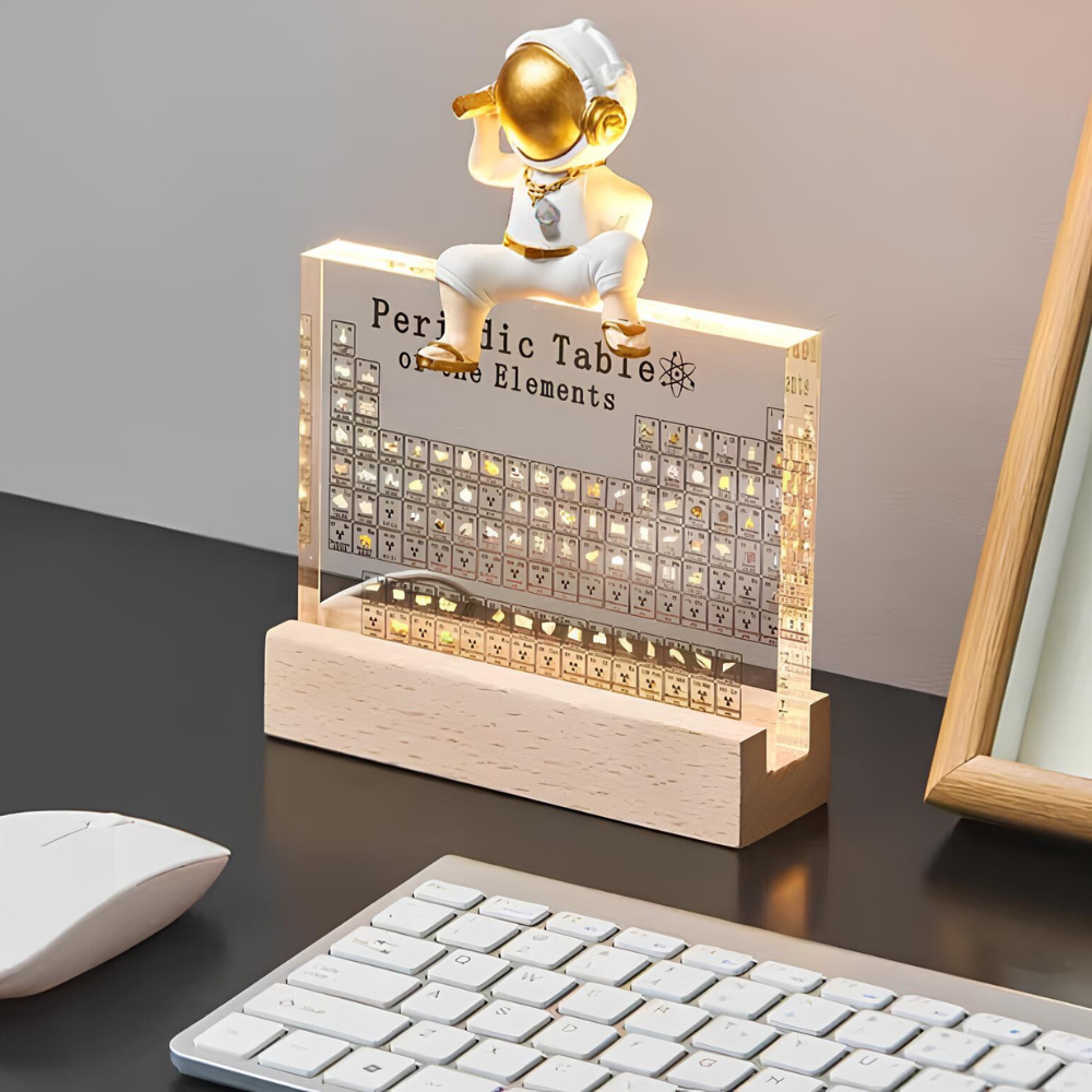 LED Periodic Table Element Display with a gold astronaut on grid by Moktan Sabai on Tampa Home & Garden Store