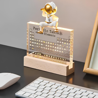 LED Periodic Table Element Display with a gold astronaut on grid by Moktan Sabai on Tampa Home & Garden Store