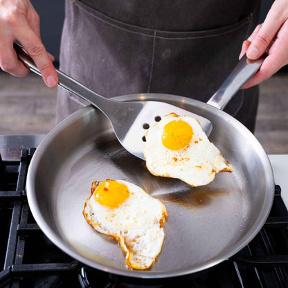 5-Ply Stainless Cookware Set, 5-Piece by Alva Cookware; eggs frying in a stainless steel pan on Tampa Home & Garden Store