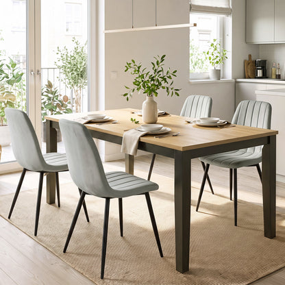 Upholstered Dining Chairs set of 4 with metal legs in light grey fabric around a wooden dining table on Tampa Home & Garden Store