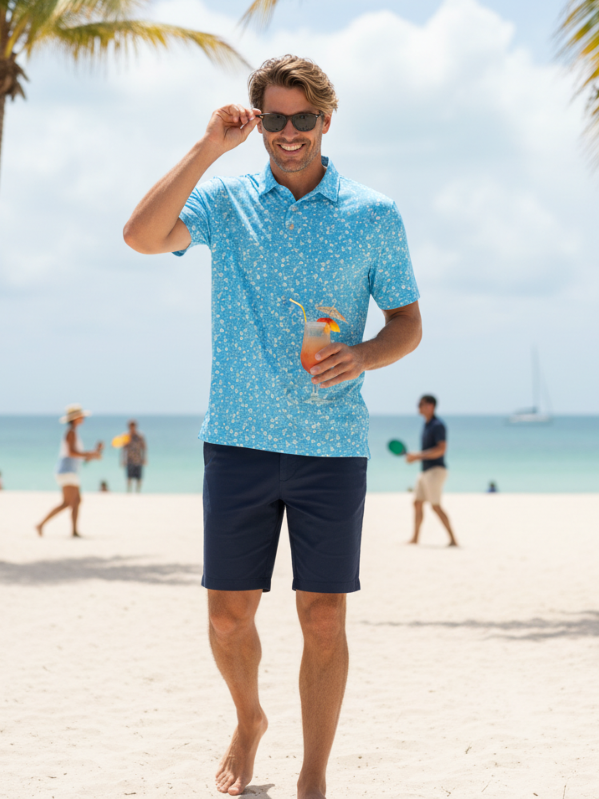 Vacation Performance Polo in blue speckle pattern by White Water Life on Tampa Home & Garden Store