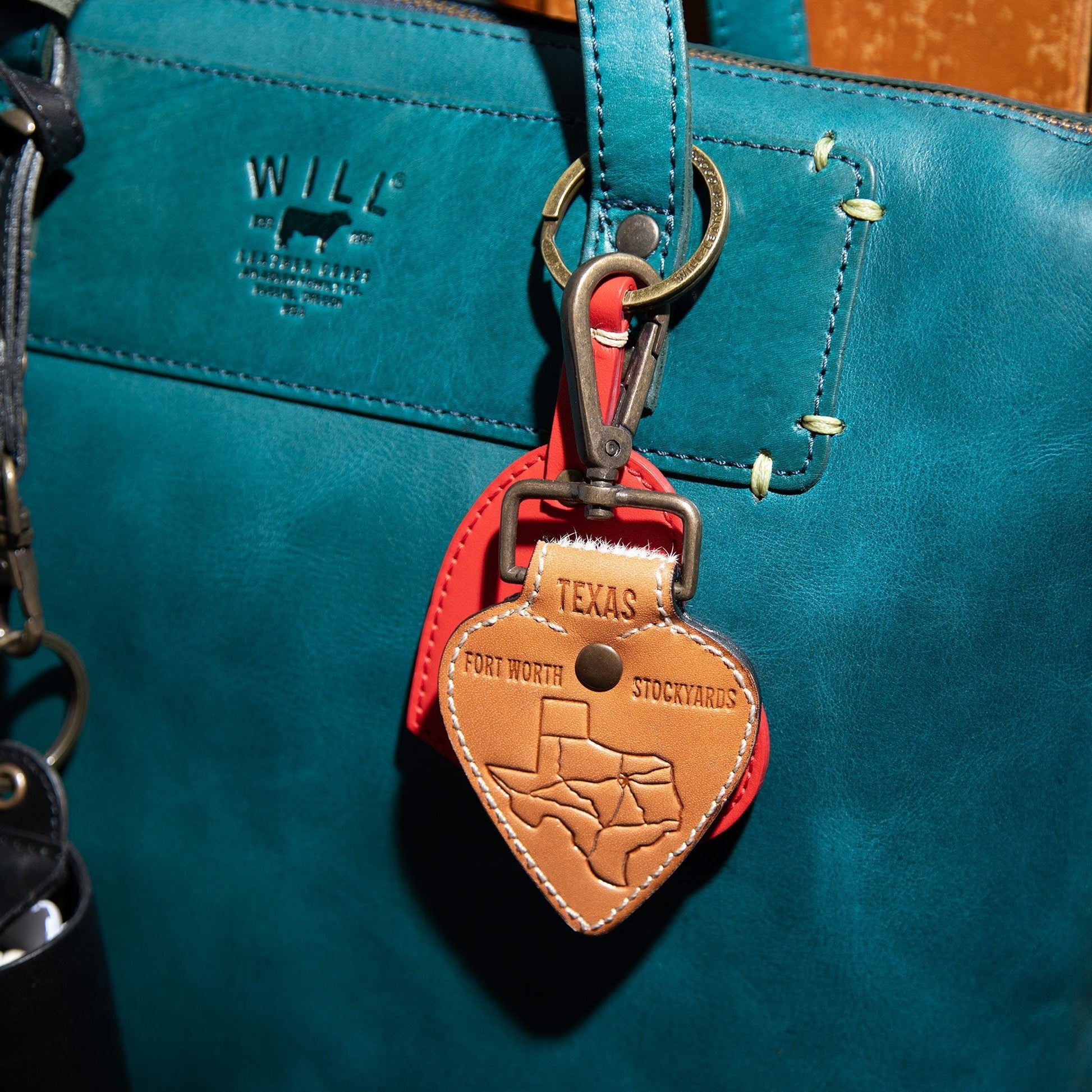 Simple Satchel by Will Leather Goods in teal leather with brass hardware and Texas tag on Tampa Home & Garden Store