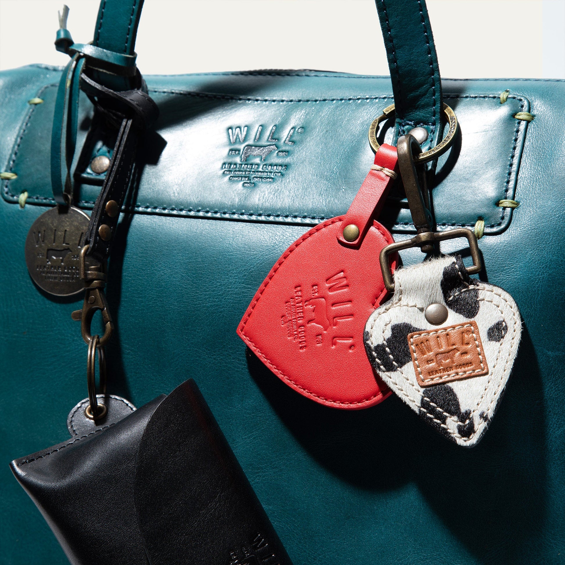 Simple Satchel teal leather bag by Will Leather Goods with colorful tag accents on Tampa Home & Garden Store