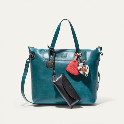 Will Leather Goods Simple Satchel teal leather bag with top handles and decorative tags on Tampa Home & Garden Store