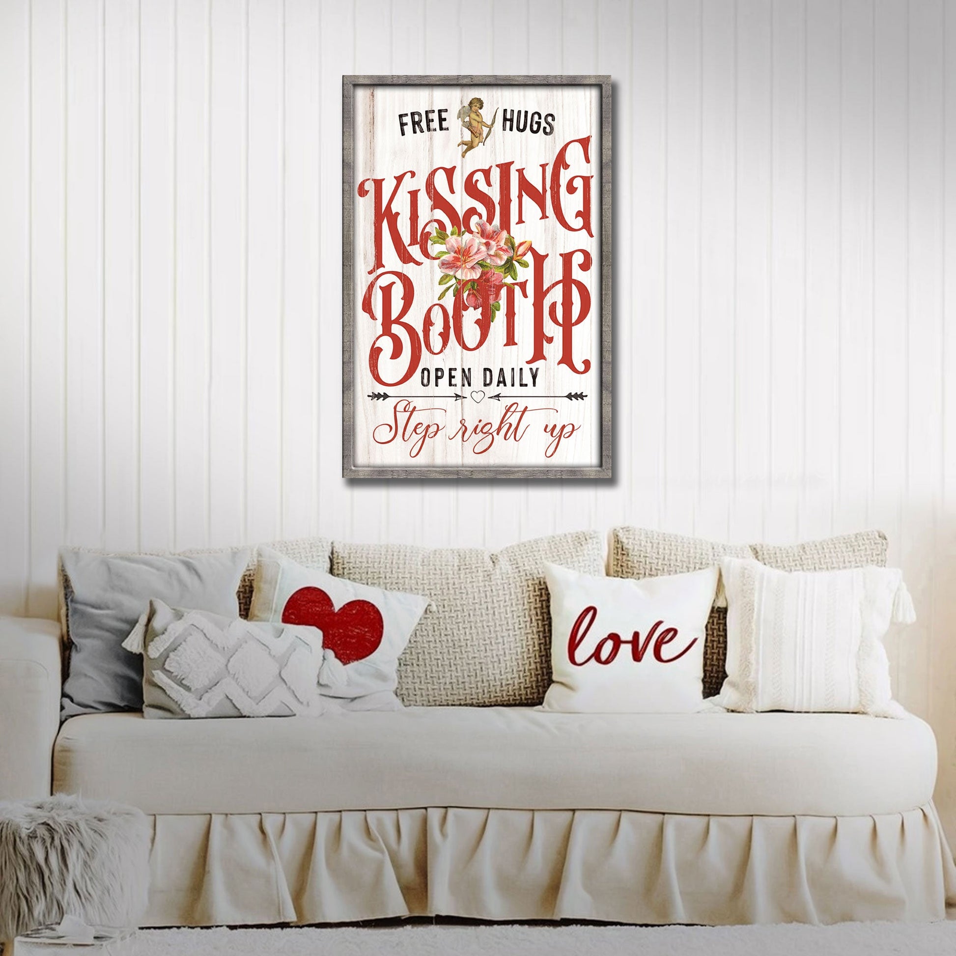 Kissing Booth canvas sign with distressed white backdrop, red vintage lettering and bouquet on Tampa Home & Garden Store