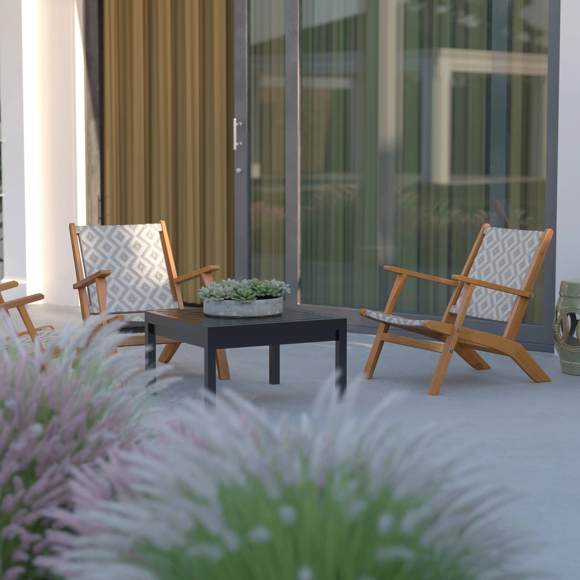 Vega Acacia Outdoor Chair pair in diamond-weave wicker with natural wood frames on patio on Tampa Home & Garden Store