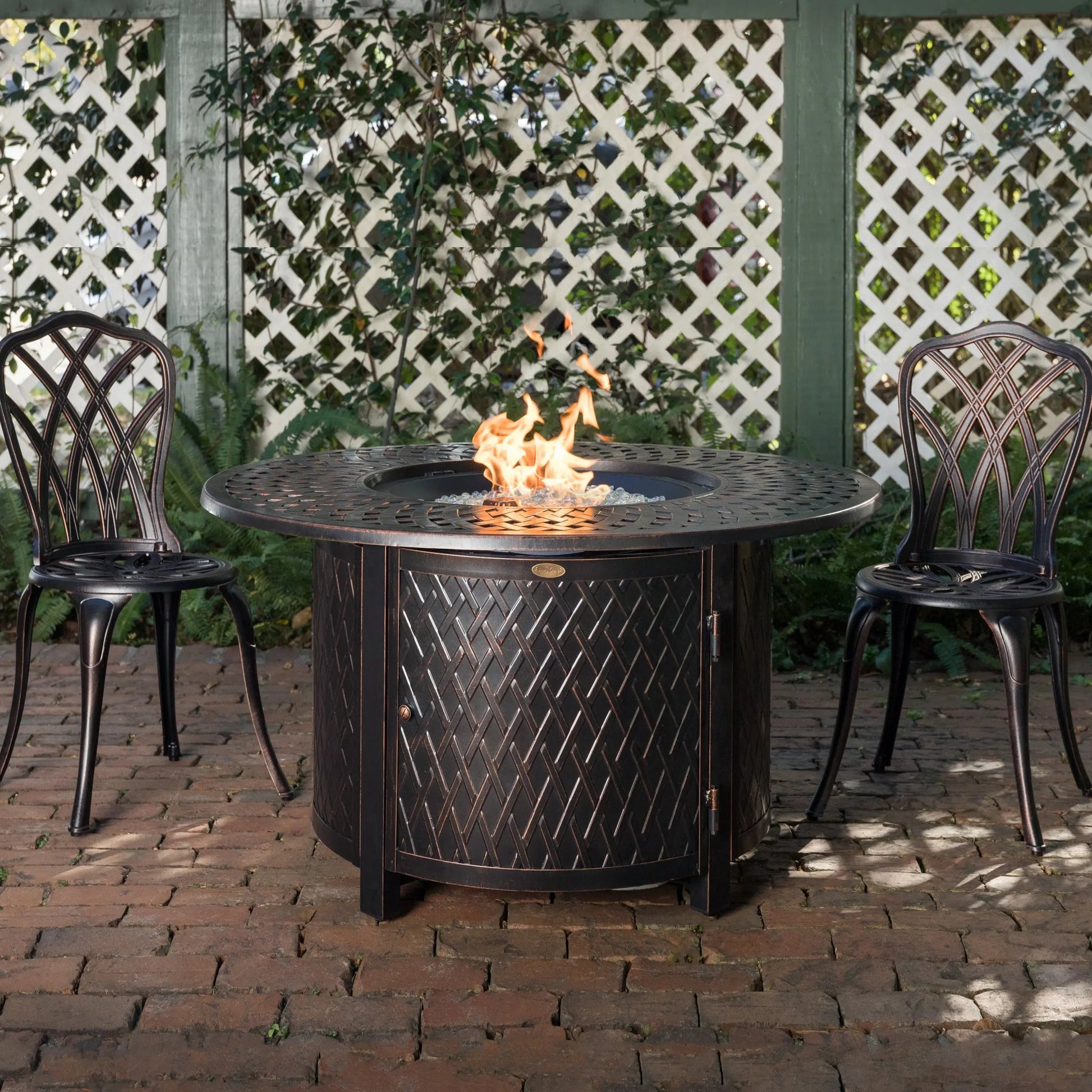 Verona 44in round woven aluminum gas fire pit table dark bronze with flames on Tampa Home & Garden Store