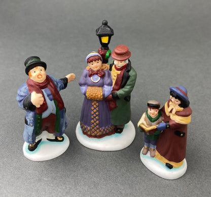 Village Accessories by Department 56.  Town Square Carolers.  Handpainted Set of Three Porcelain Figurines.  Heritage Village Collection. - Tampa Home & Garden Store