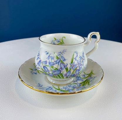 Vintage Forget-Me-Not teacup and saucer with blue floral pattern and gold trim on porcelain on Tampa Home & Garden Store