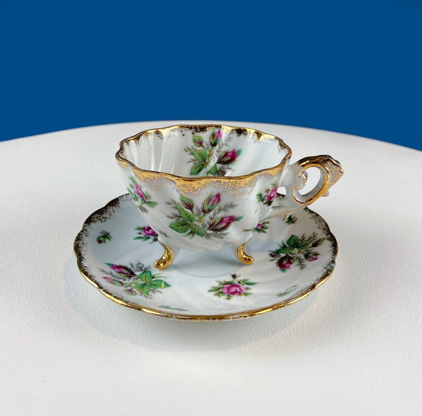 Vintage Moss Rose Porcelain Tea Cup and Saucer: Gold Swirl Silhouette - Tampa Home & Garden Store