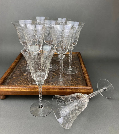 Set of 4 Newton Crystal goblets, clear cut-crystal stemware with floral patterns on a tray on Tampa Home & Garden Store