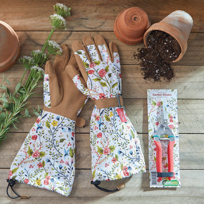 Compact pruning shears by Womanswork with pink handles, floral gloves and terracotta pots on Tampa Home & Garden Store