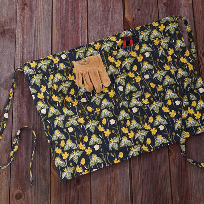 Gardener's Half Apron by Womanswork in navy floral fabric with yellow flowers on Tampa Home & Garden Store