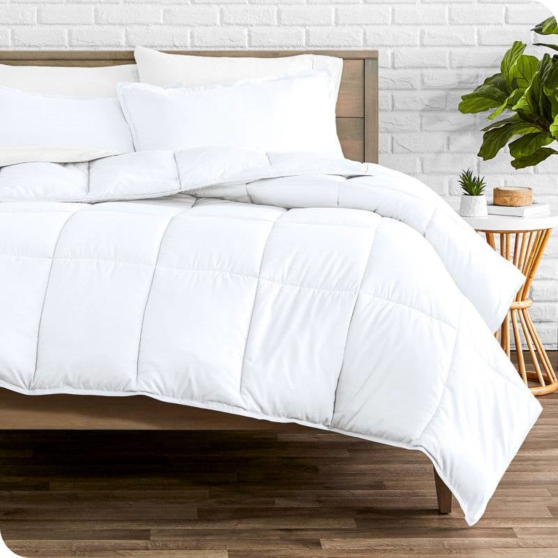 Queen size HomePacific super soft microfiber down alternative comforter set in white on bed on Tampa Home & Garden Store