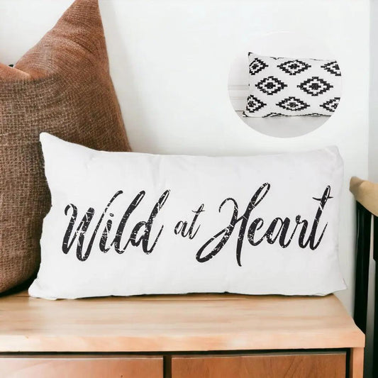 Wild at Heart throw pillow by Gia Roma, white cover with black script and tribal inset pillow on Tampa Home & Garden Store