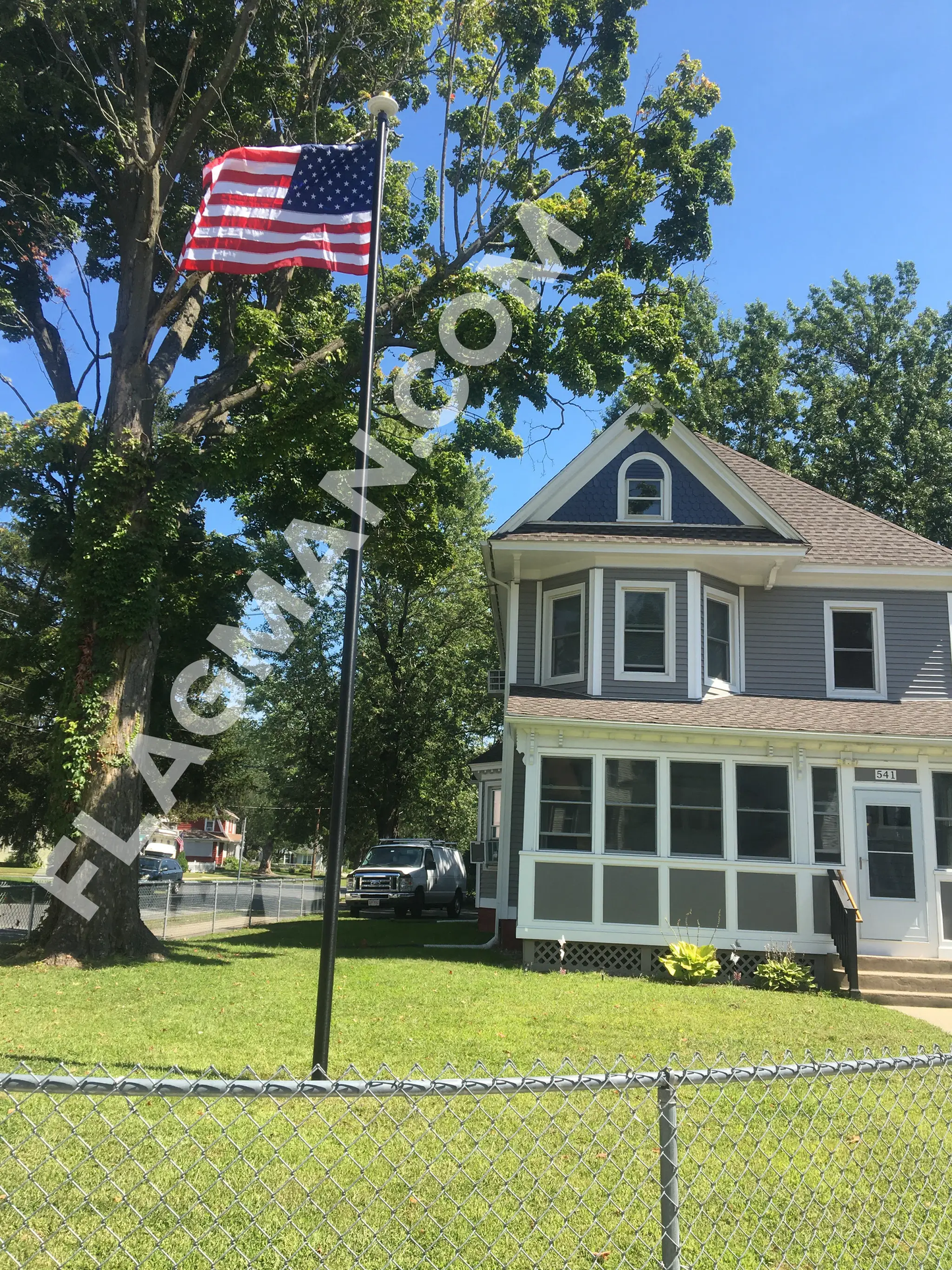 Aluminum flagpole with external rope heavy duty displaying American flag on Tampa Home & Garden Store