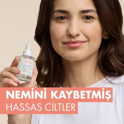 Hydrance Boost Serum Concentrate 30ml by Avène skin care serum held by smiling woman on Tampa Home & Garden Store