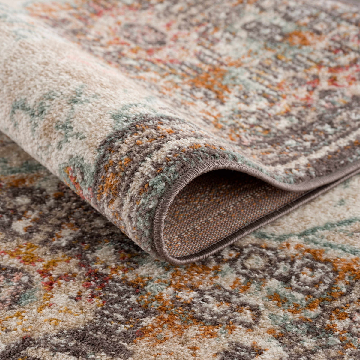 Woorabinda Area Rug by Boutique Rugs with plush beige teal orange gray pile on Tampa Home & Garden Store