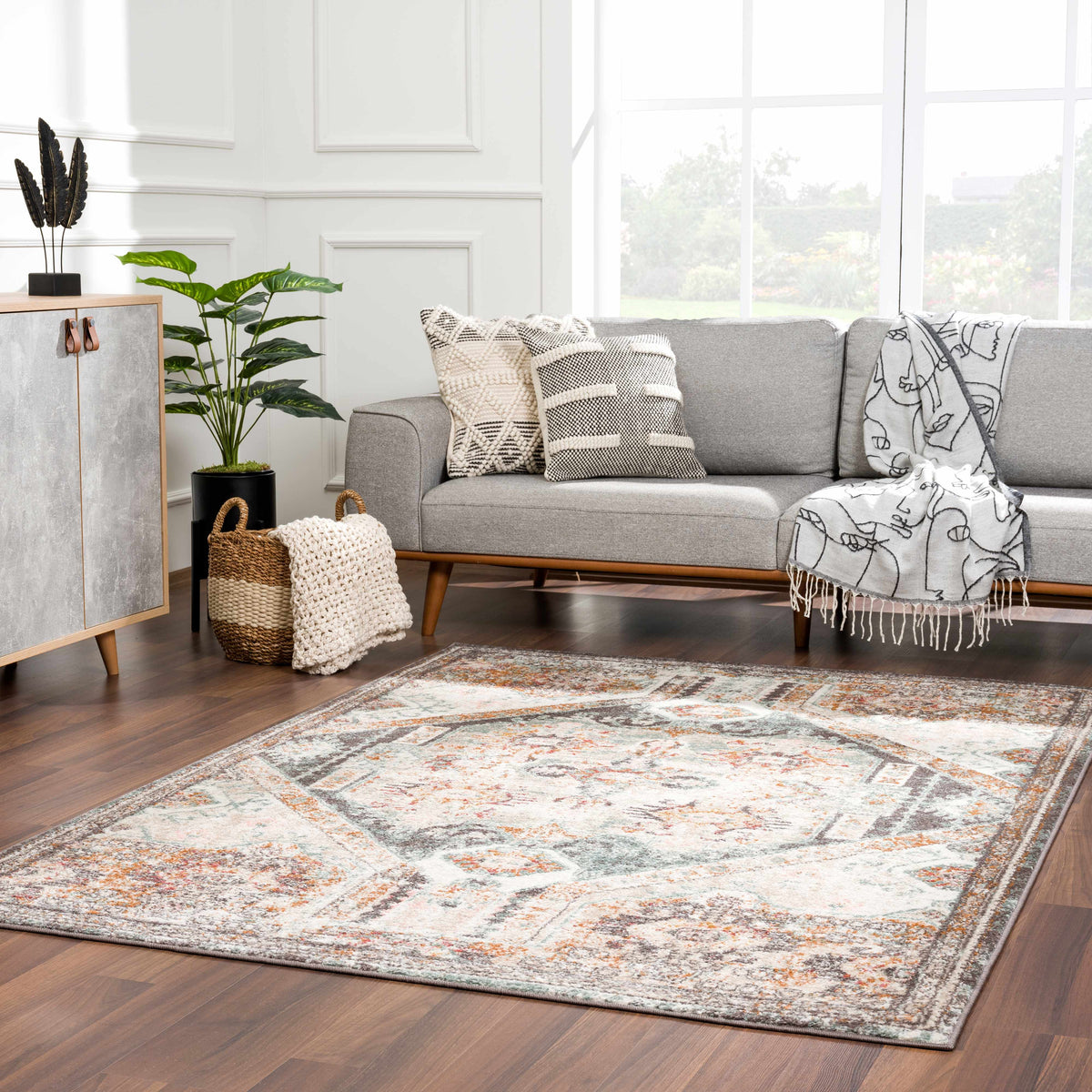 Woorabinda Area Rug by Boutique Rugs in gray ivory orange abstract pattern on Tampa Home & Garden Store