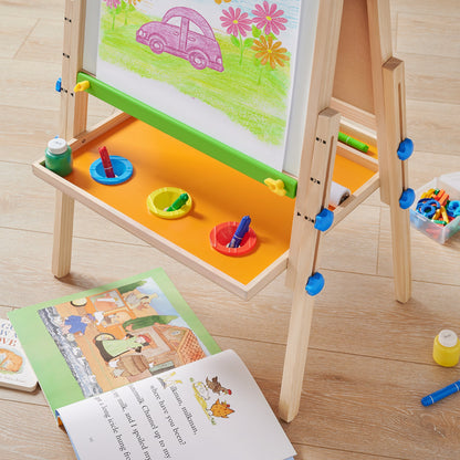 Tiny Land 3-in-1 kids art easel with orange workspace and green ledge, colorful supplies on Tampa Home & Garden Store
