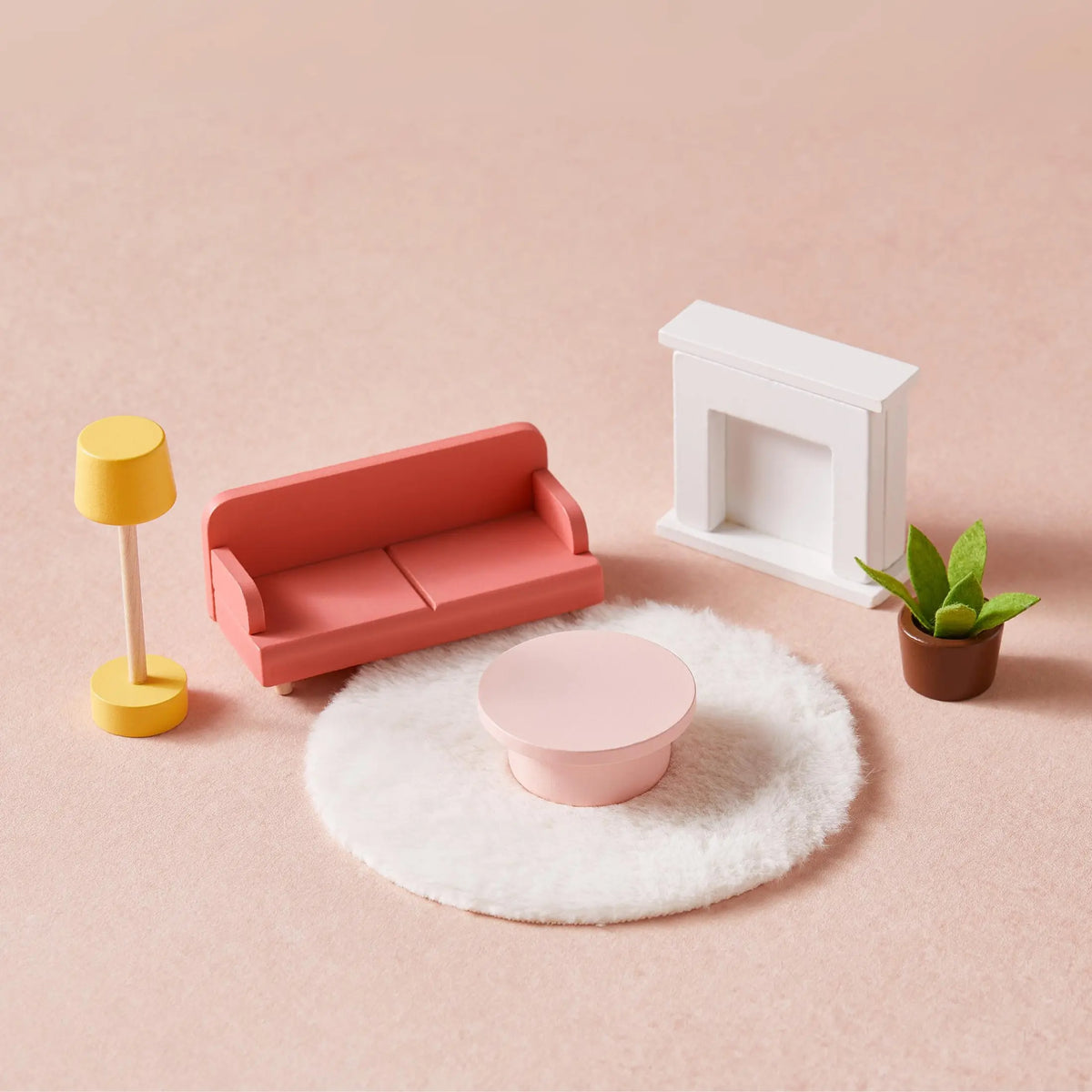 Tiny Land Sweetwood Dollhouse living room set with pink sofa, white fireplace and lamp on Tampa Home & Garden Store