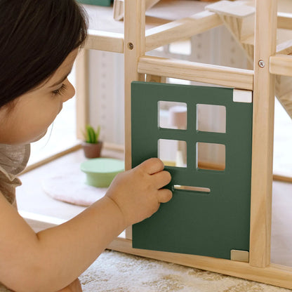 Green Tiny Land Sweetwood dollhouse wall panel with four windows mounted on a wooden frame on Tampa Home & Garden Store